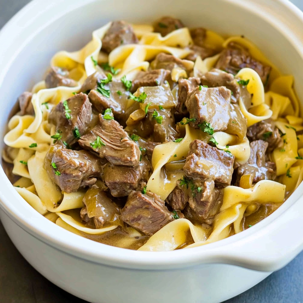 Recipe preparation for Slow-Cooked Beef Stroganoff with Egg Noodles